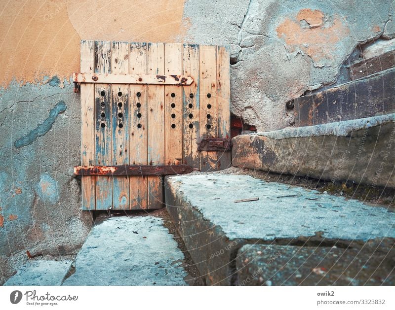 Fitted Wall (barrier) Wall (building) Facade Door Stairs Stone Wood Metal Rust Old Blue Orange Turquoise Decline Past Transience Hinge Locking bar torgau Saxony