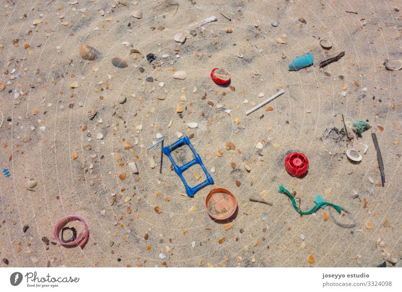 Plastics on the sand of the beach. Awareness Beach Bottle Clean Coast ears sticks Ecological Education Environment Free Future lollipops micro Nature Ocean