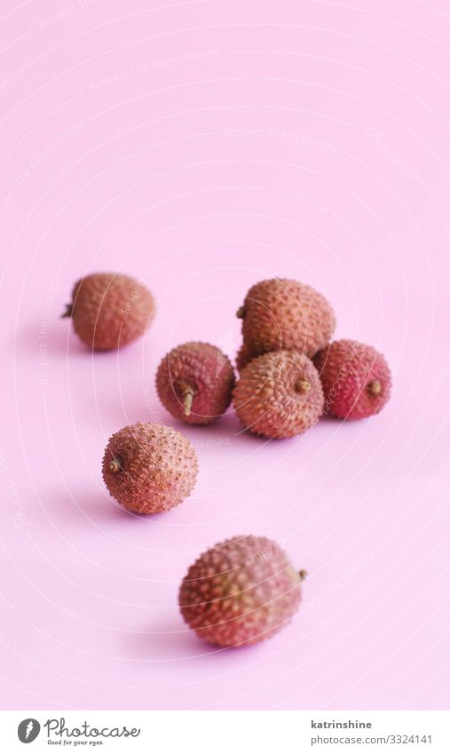 Fresh litchi fruits on a light pink backgrpund Fruit Diet Exotic Hip & trendy Juicy Pink Lychee litchi fruits fruit Mature Raw sweet lichi Copy Space chinese