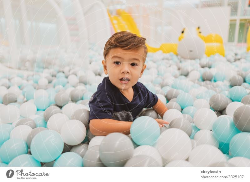 Happy young toddler boy playing in the indoor play area Joy Beautiful Playing Child Human being Baby Toddler Boy (child) Man Adults Family & Relations Infancy