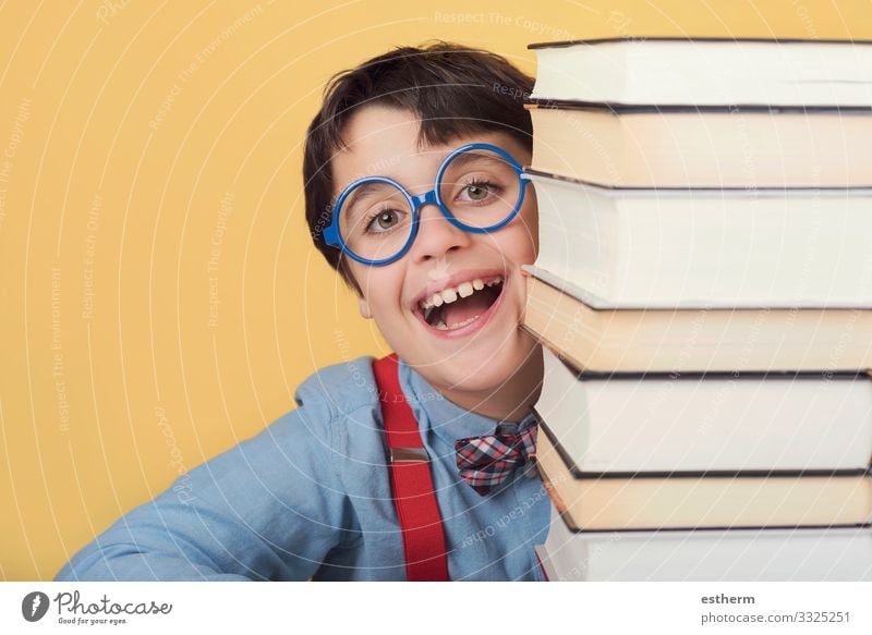 happy and smiling child with books Lifestyle Joy Playing Reading Education Child School Study Schoolchild University & College student Human being Masculine
