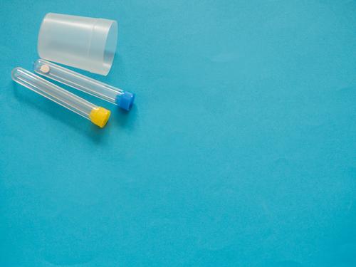 Analysis tubes on blue background with copy space Bottle Health care Illness Medication Science & Research Laboratory Examinations and Tests Container Tube