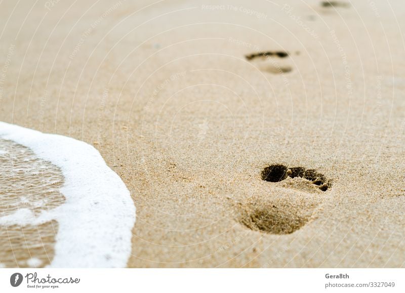 footprints in the sand on the beach near the surf Beach Ocean Waves Wallpaper Nature Sand Footprint Yellow White background foam Tracks Surf water yellow sand