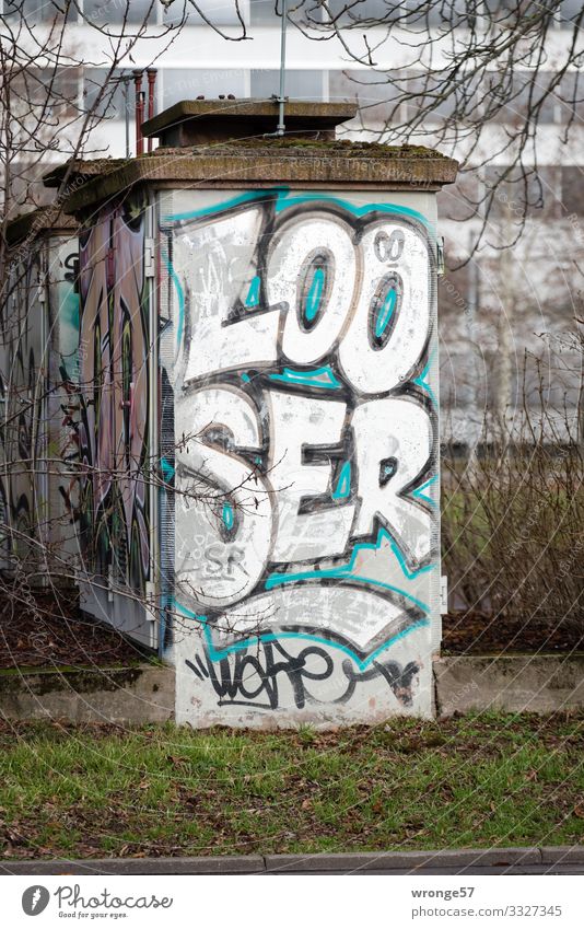 Looser Energy industry Industrial plant Wall (barrier) Wall (building) Town Brown Black Turquoise White Graffiti Building Controller Colour photo Subdued colour