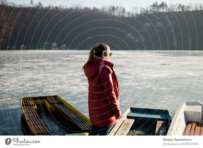 Young woman standing by the frozen lake Freedom Winter Human being Feminine Youth (Young adults) Woman Adults Life 1 30 - 45 years Nature Water Ice Frost