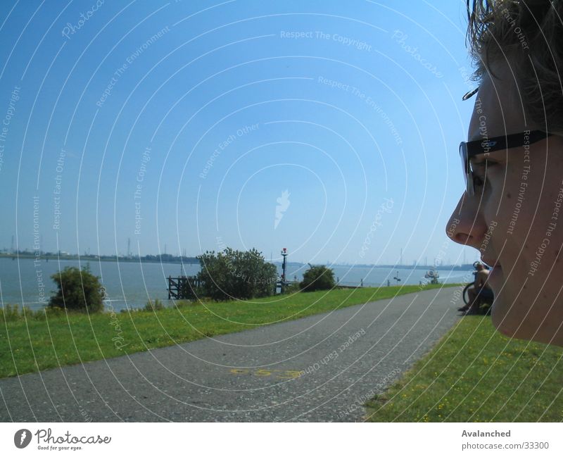 Man with optical device Grass Ocean Human being Face small wood walked Water Landscape Wharf