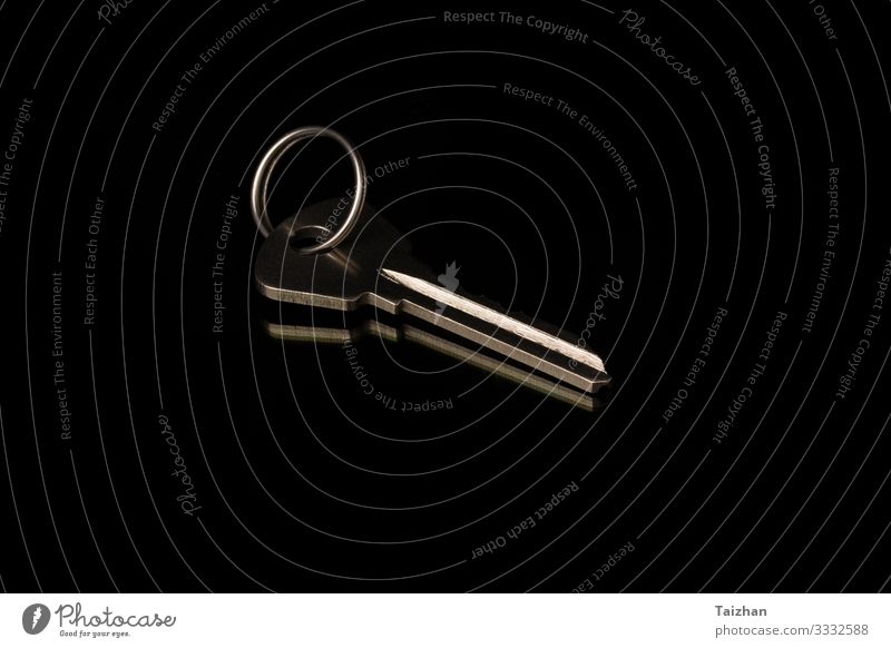 chrome metal key on black background. Success Business Tool Ring Metal Authentic Dirty Above Black Safety Protection Safety (feeling of) estate Access close