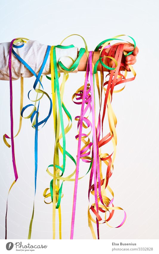 streamers Human being Feminine Child Girl Boy (child) Infancy Arm 1 String Paper streamers Hang Leisure and hobbies Carnival Colour photo Multicoloured