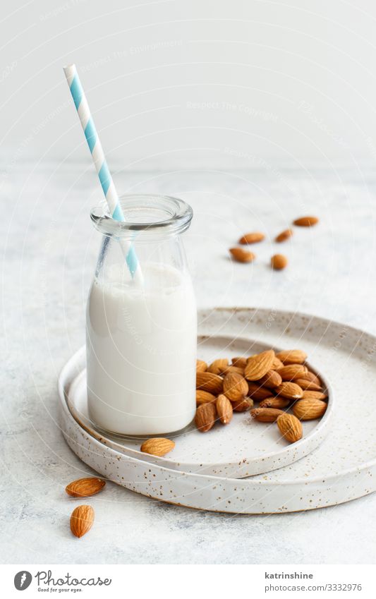 Vegan almond milk, non dairy alternative milk Vegetable Nutrition Breakfast Vegetarian diet Diet Beverage Plate Bottle Fresh Natural Alternative almonds