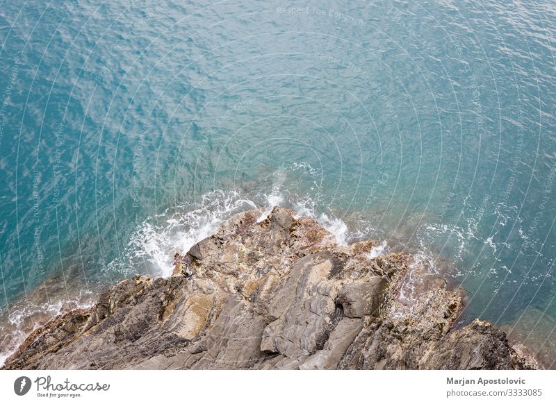 Top view of the sea waves hitting the shore Environment Nature Landscape Water Spring Summer Waves Coast Bay Ocean Mediterranean sea Stone Natural Blue