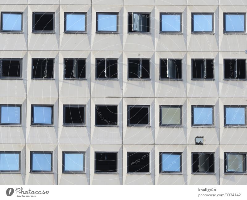 airing Town House (Residential Structure) High-rise Facade Window Window pane Broken Blue Black Living or residing Vacancy Building for demolition Colour photo