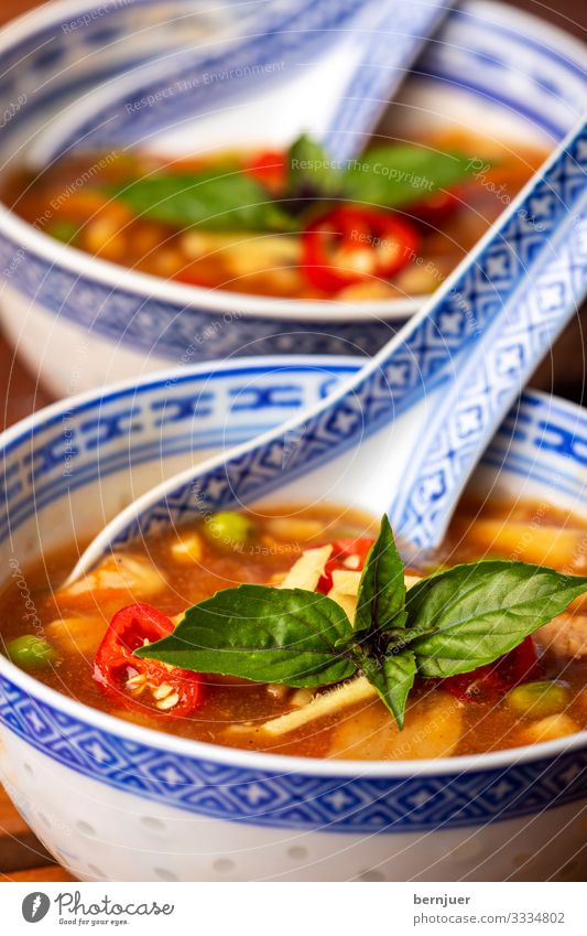 Chinese sweet-and-sour soup Meat Vegetable Soup Stew Herbs and spices Lunch Dinner Restaurant Hot Delicious Red Sour Kitchen Asian Meal Porcelain Spicy Mushroom