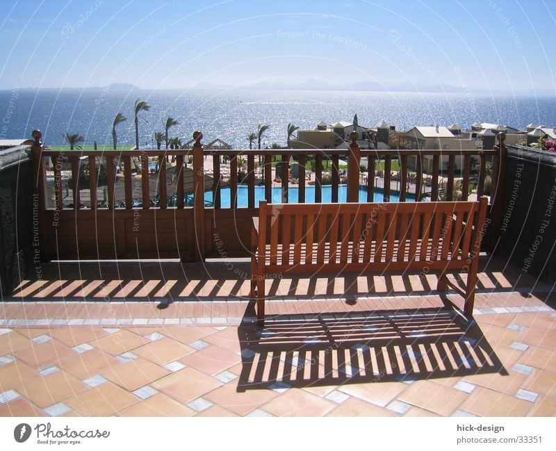 sunbed Vacation & Travel Lanzarote Ocean Swimming pool Hotel Summer Bench terrace Sun Shadow Blue sky