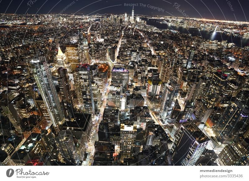 New York City at Night Street gorge of houses Night shot clearer Traffic infrastructure urban Empire State building top of the rock
