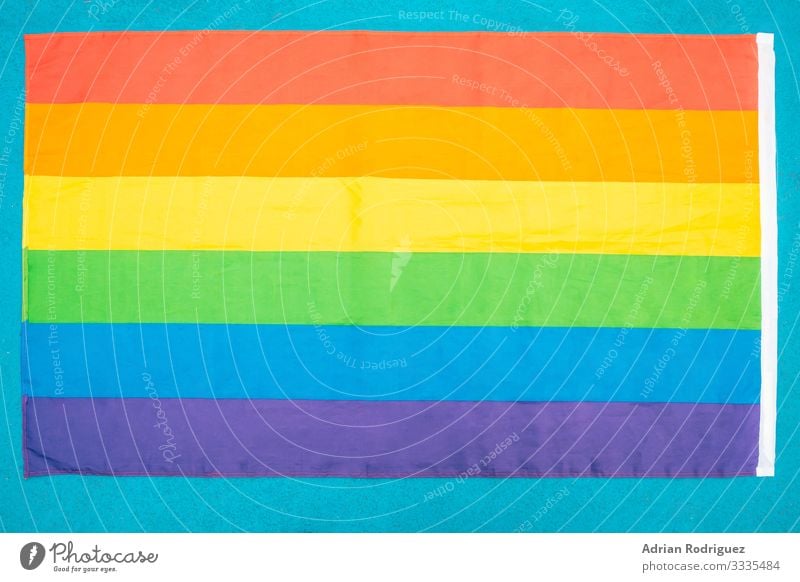 Gay pride flag from top view on blue background Freedom Homosexual Friendship Group Media Stripe Flag Love Dream Strong Acceptance Pride Colour Society Rainbow