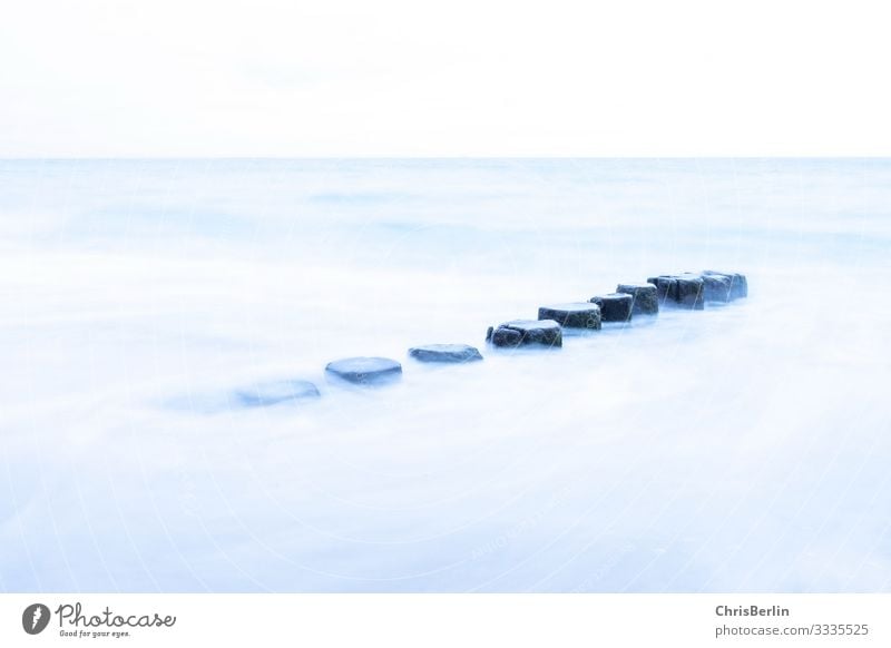Groynes in the Baltic Sea - long time exposure Far-off places Freedom Ocean Nature Landscape Water wood Force Calm Esthetic Peace Stage Delicate Subdued colour