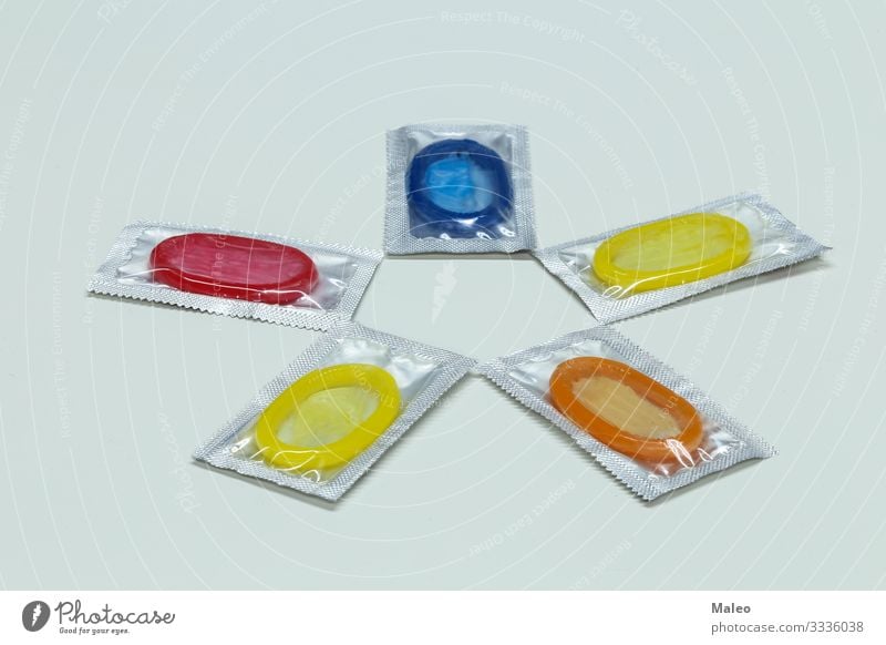 Packs of colorful condoms Packing material Multicoloured Product Rubber Protection Human being Colour AIDS Healthy Health care Romance Sexuality Life