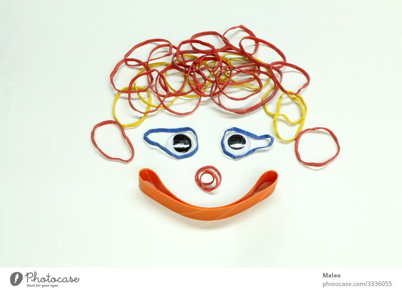 Funny face made of colorful rubber bands Elastic Multicoloured Elastic band Rubber String Office Green Colour Things Background picture Structures and shapes