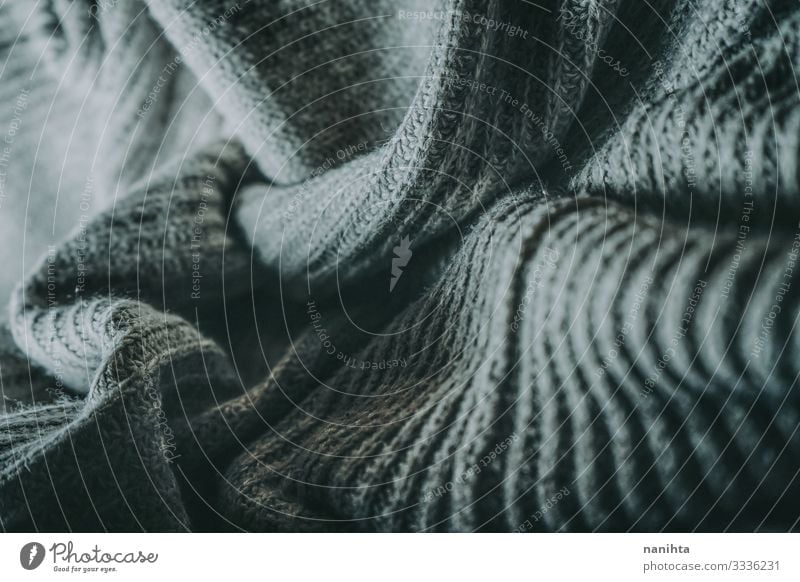 Detail of woolen warm clothes texture textile soft winter surface contrast wave gray grey monochrome clothing fashion wallpaper abstract organic natural fiber