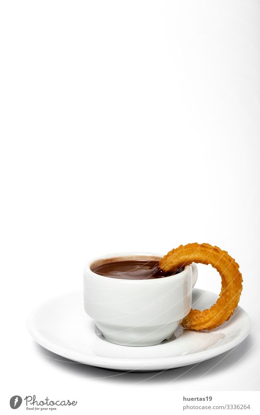 Cup of chocolate sauce with churros Food Dessert Breakfast Beverage Hot Chocolate Culture Brown White Tradition spanish Churros background cup Baked goods
