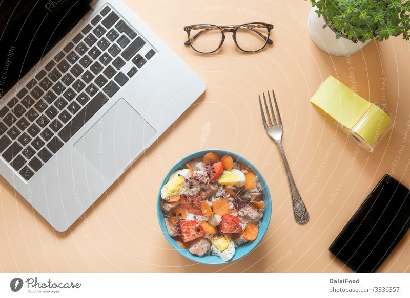 Desk table with computer, glasses and food in bowl Style Disciplined Tablet computer Computer Person wearing glasses Food Bowl Colour photo