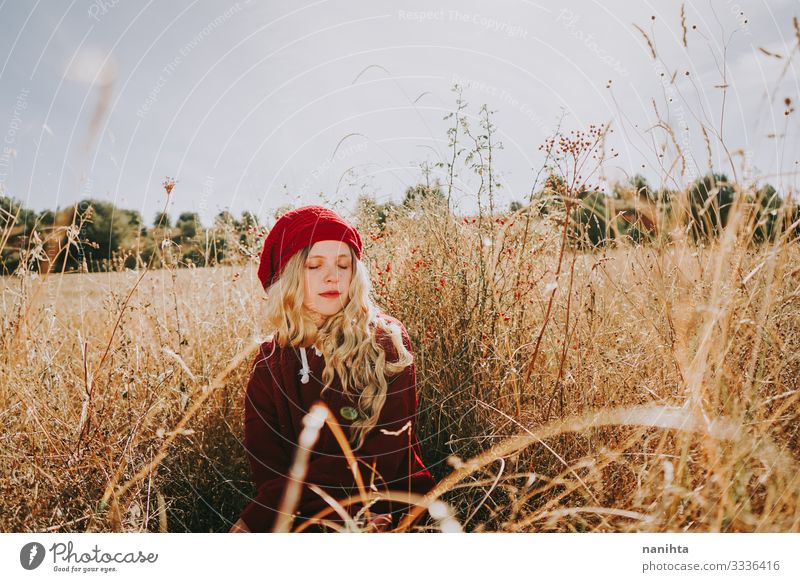 Young woman in a field in a sunny day Senses Calm Summer Human being Feminine Woman Adults Youth (Young adults) 1 18 - 30 years Nature Landscape Autumn