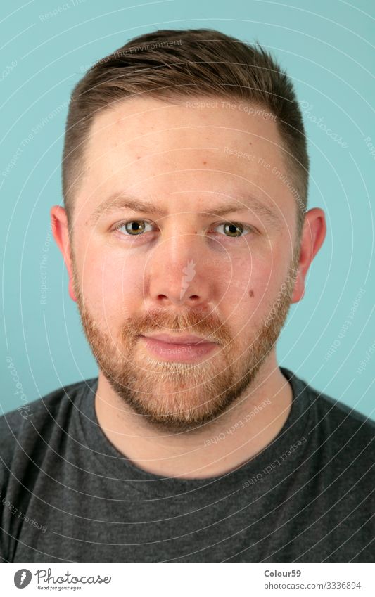Portrait of a young man Human being Masculine Face 1 Observe Positive portrait Man Beard youthful casually Beautiful look eyes Colour photo Studio shot