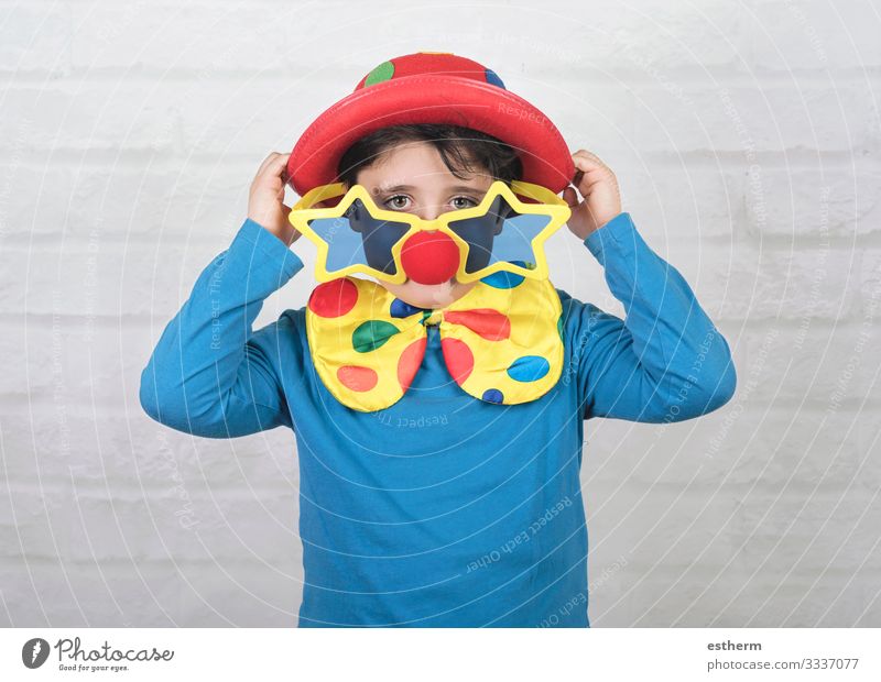 child with clown nose and funny glasses Lifestyle Playing Party Feasts & Celebrations Carnival Hallowe'en Birthday Human being Masculine Child Boy (child)