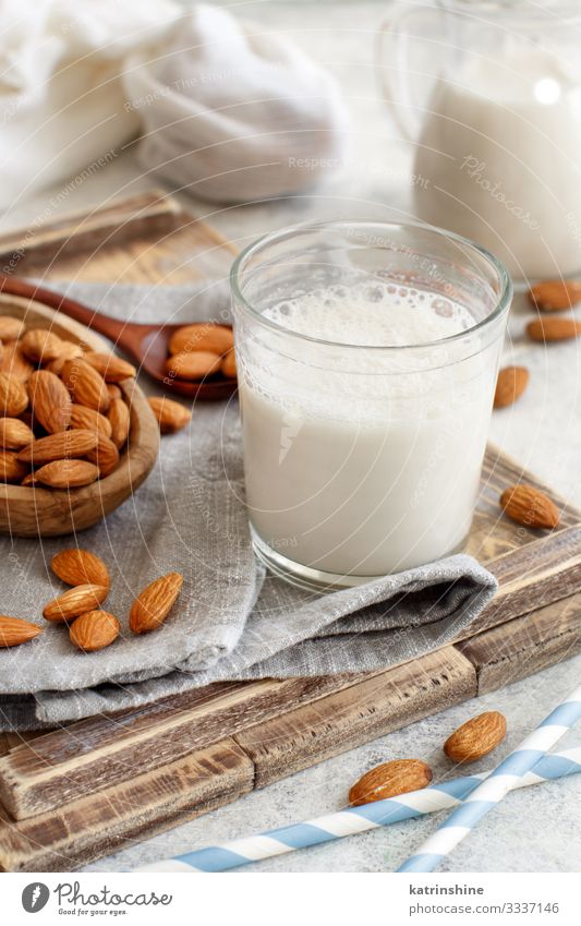 Vegan almond milk, non dairy alternative milk Vegetable Nutrition Breakfast Vegetarian diet Diet Beverage Spoon Fresh Natural Alternative almonds Vegan diet