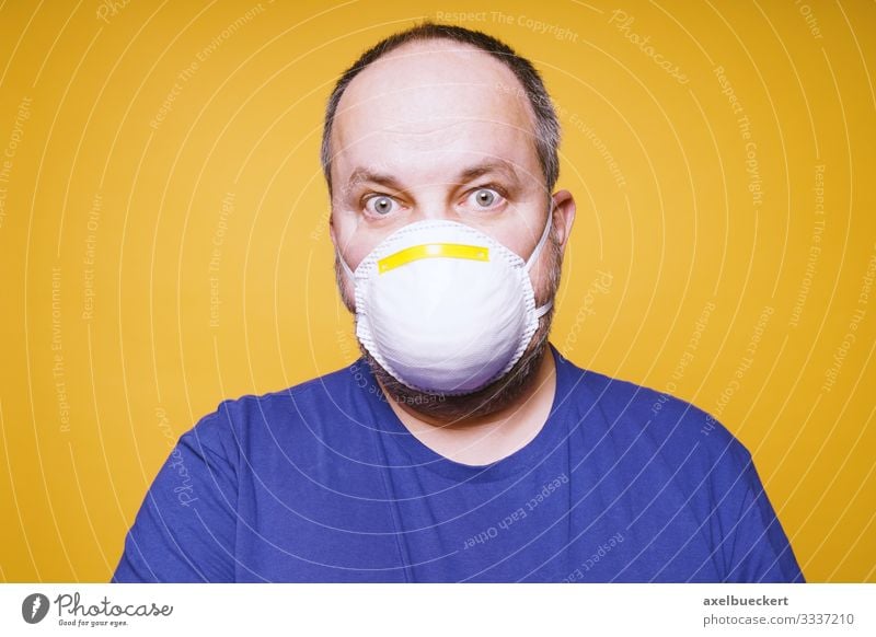 Man with mouth guard - Coronavirus hysteria Lifestyle Healthy Health care Illness Human being Masculine Adults 1 30 - 45 years 45 - 60 years Environment Fear
