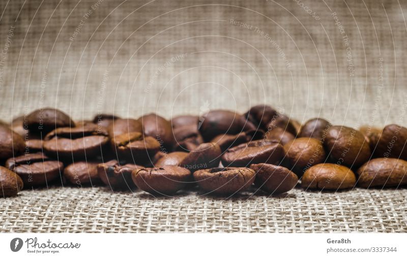 many coffee beans on a matting macro Breakfast Coffee Cloth Dark Fresh Natural Brown Black Energy Colour Aromatic backdrop background Beans Beige blur blurry