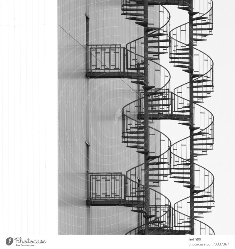 double spiral staircase side by side Industrial plant Warehouse Wall (barrier) Wall (building) Stairs Facade Emergency exit Winding staircase Steel Line Curve