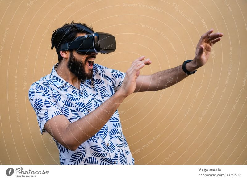 woman playing with VR-headset glasses. Face Playing Entertainment Headset Technology Human being Boy (child) Man Adults Youth (Young adults) 1 18 - 30 years