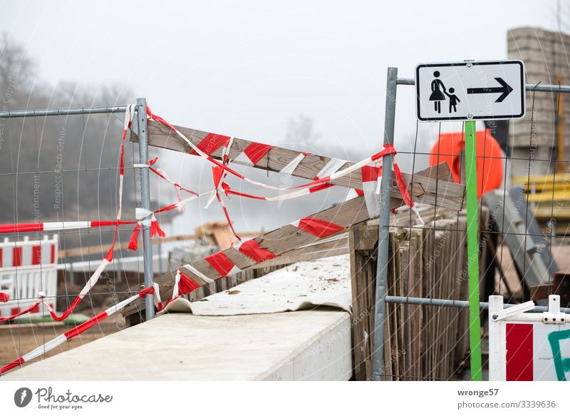 Passage blocked Wall (barrier) Wall (building) Footpath Signs and labeling Signage Warning sign String Town Brown Gray Red White Sidewalk Construction site