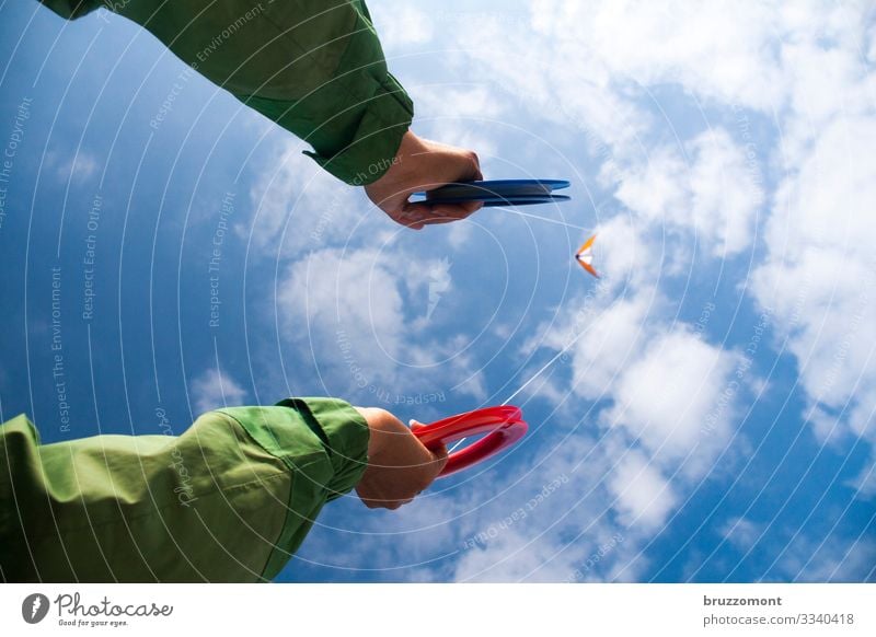kiteflite Leisure and hobbies Human being Life Arm Hand 1 Sky Clouds Beautiful weather Relaxation To hold on Flying Playing Sports Far-off places Tall Athletic