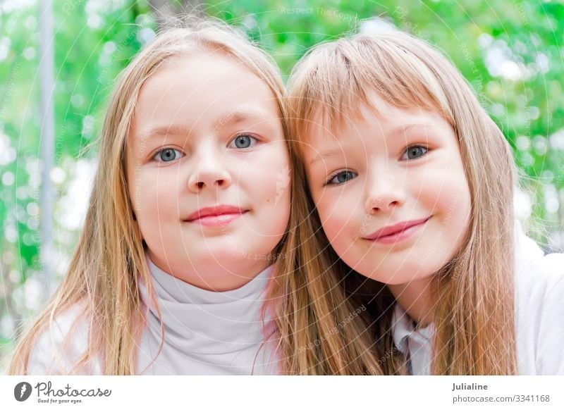 Cute two girls Child Schoolchild Woman Adults Sister Infancy Blonde White kid European Caucasian preschooler six 7 eight nine Colour photo Multicoloured