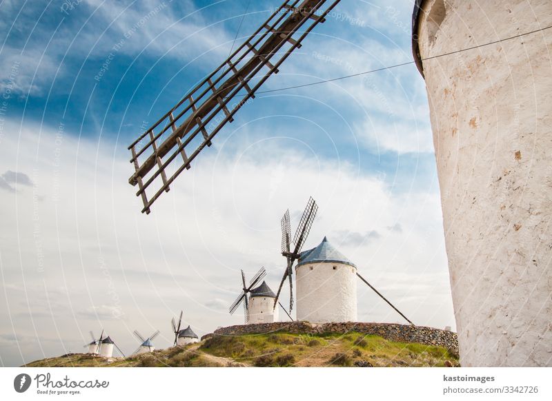 Vintage windmills in La Mancha. Vacation & Travel Tourism Summer Mountain House (Residential Structure) Culture Environment Nature Landscape Plant Clouds Wind