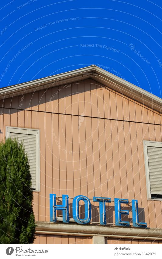 Hotel illuminated advertising on house wall Lifestyle Leisure and hobbies Vacation & Travel Tourism Summer Summer vacation Transport Living or residing Poverty