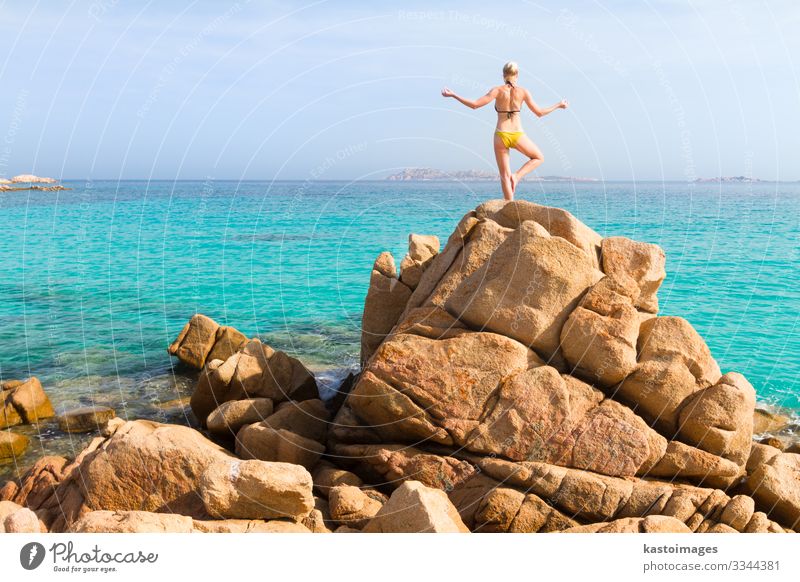 Woman practicing yoga at the beach. Lifestyle Beautiful Body Harmonious Relaxation Calm Meditation Leisure and hobbies Vacation & Travel Summer Sun Beach Ocean