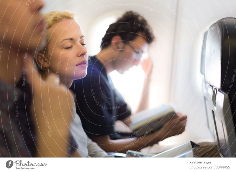 People flying by plane. Vacation & Travel Tourism Trip Chair Economy Business Aviation Woman Adults Hut Transport Airplane Aircraft Flight Attendant Sleep Dream