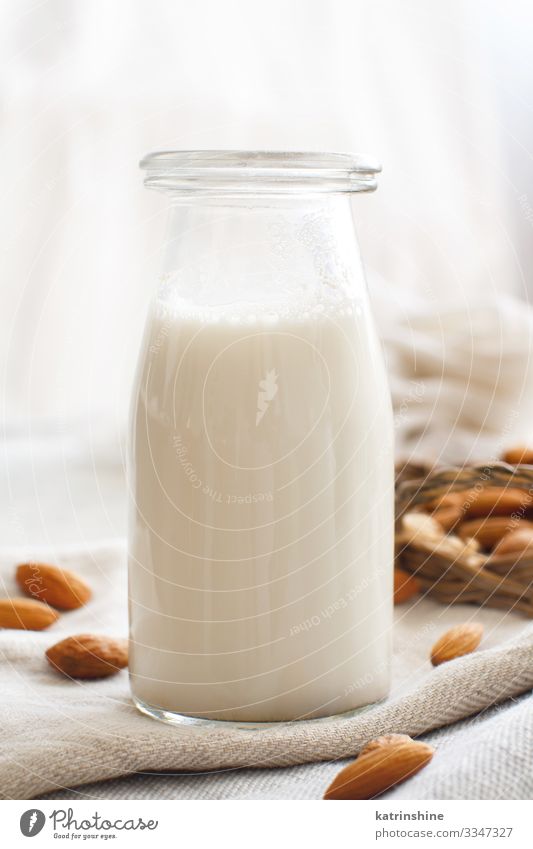 Vegan almond milk, non dairy alternative milk Vegetable Nutrition Breakfast Vegetarian diet Diet Beverage Bottle Fresh Natural Alternative almonds Vegan diet