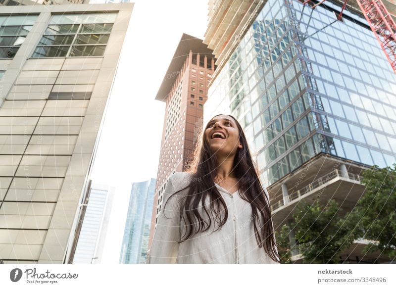 Young Indian Woman Smiling in Big City Beautiful Success Adults Youth (Young adults) High-rise Happiness Hope Future girl Financial District Marvel strive