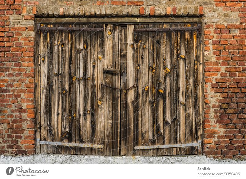 Old weathered wooden gate in brick wall Architecture Gate Wooden gate Wall (building) Transience Derelict Weathered Raw Wood grain Wood texture