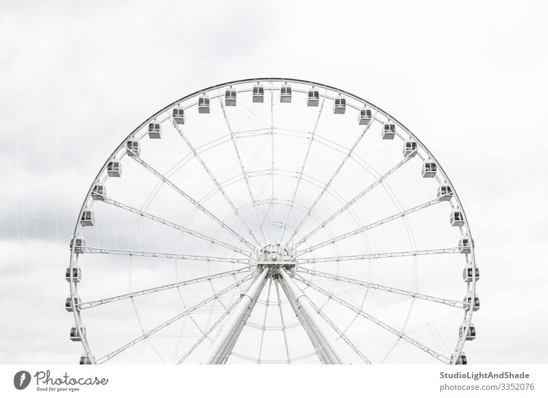 White observation wheel Elegant Tourism Sightseeing Entertainment Sky Clouds Architecture New Gray Great wheel Grande Roue Montreal Quebec Canada vieux Montreal
