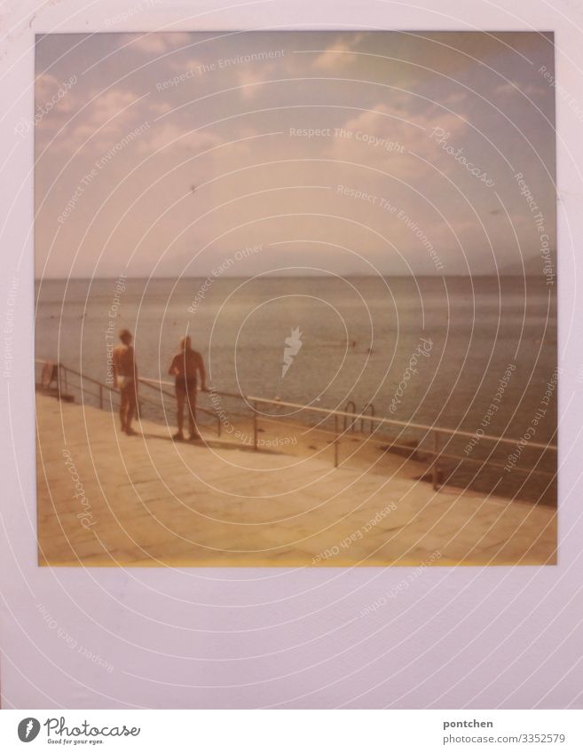 Polaroid shows: Two elderly men in swimming trunks on the beach looking at the sea Athletic Fitness Overweight Vacation & Travel Tourism Summer Summer vacation