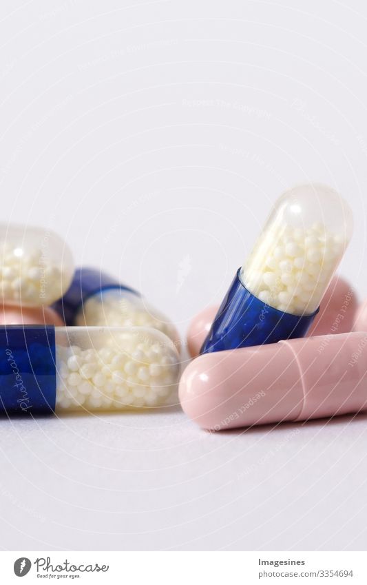 Drug - Drug Capsules. Concept of medicine Hospital Health care Medication Pharmaceuticals Medicine Hard Capsules Healthy "Blue Pink pills balls beads ,Medicine