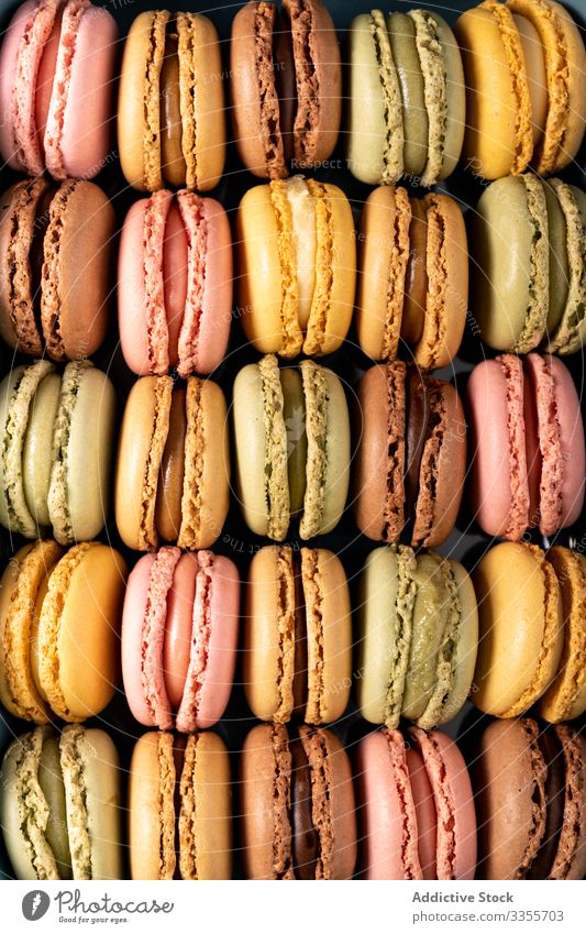 Fresh crunchy macaroons stack dessert colorful snack food biscuit sweet gourmet assorted pastry confection traditional delicious tasty yummy sugar cuisine