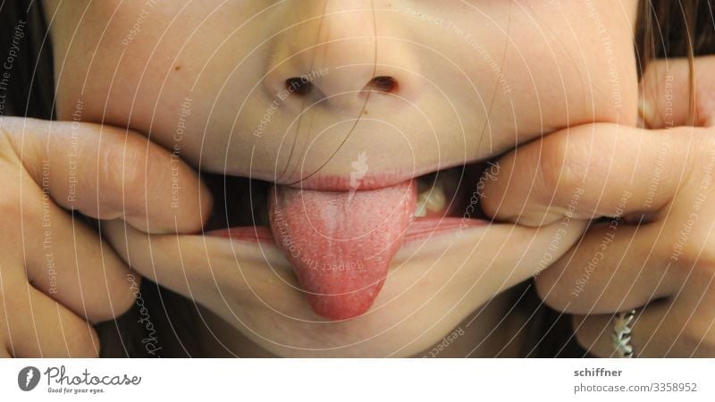 Ugh! | stick out your tongue Child Tongue show tongue tip of tongue Grimace grimace Brash cheeky Mouth Nose nostrils Fingers Infancy Parenting Childlike
