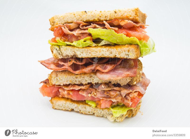A BLT is a type of sandwich Bread Fast food Tradition Bacon blt blt sandwich Cholesterol club sandwich floors isolated lettuce Meal Pork Sandwich Tomato