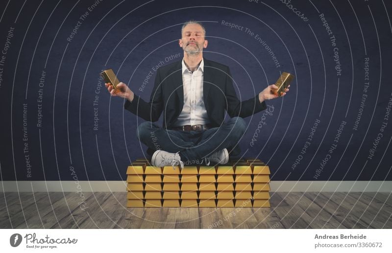 Relaxed businessman sits on a stack of gold bars succeed million financial invest golden millionaire finance money wealth abundance coin winner saving lottery